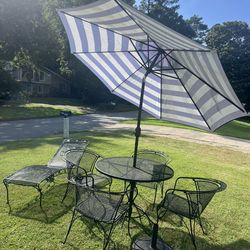 8 peace Outdoor table with four chairs , umbrella with stand , (( one  Lounge Chair fresh paint ))