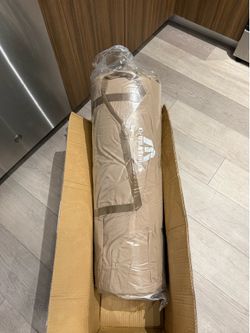 Self inflating sleeping pad