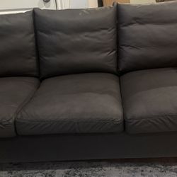 Faux leather three seat sofa