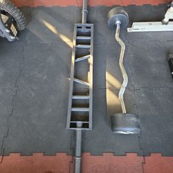 100lb power system curl bar plus a Swiss bar