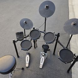 Alesis DM7X Nitro electric drum set with PDP Throne