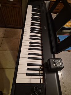 Yamaha Piaggero Electric Keyboard NP-12 61 Key Black Portable Piano
