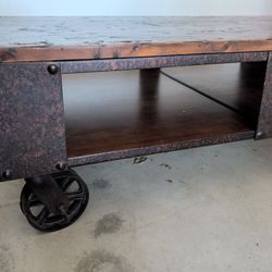 Wood Coffee Table With Metal Wheels And Two Side Tables