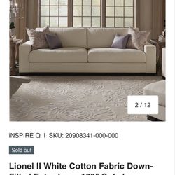 Cream Sofa With Ottoman And Throw Pillows