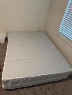 Queen Mattress in Plastic Wrap