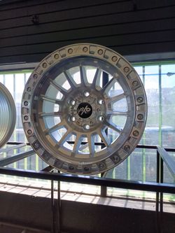17x9 6x139 New silver AXD rims