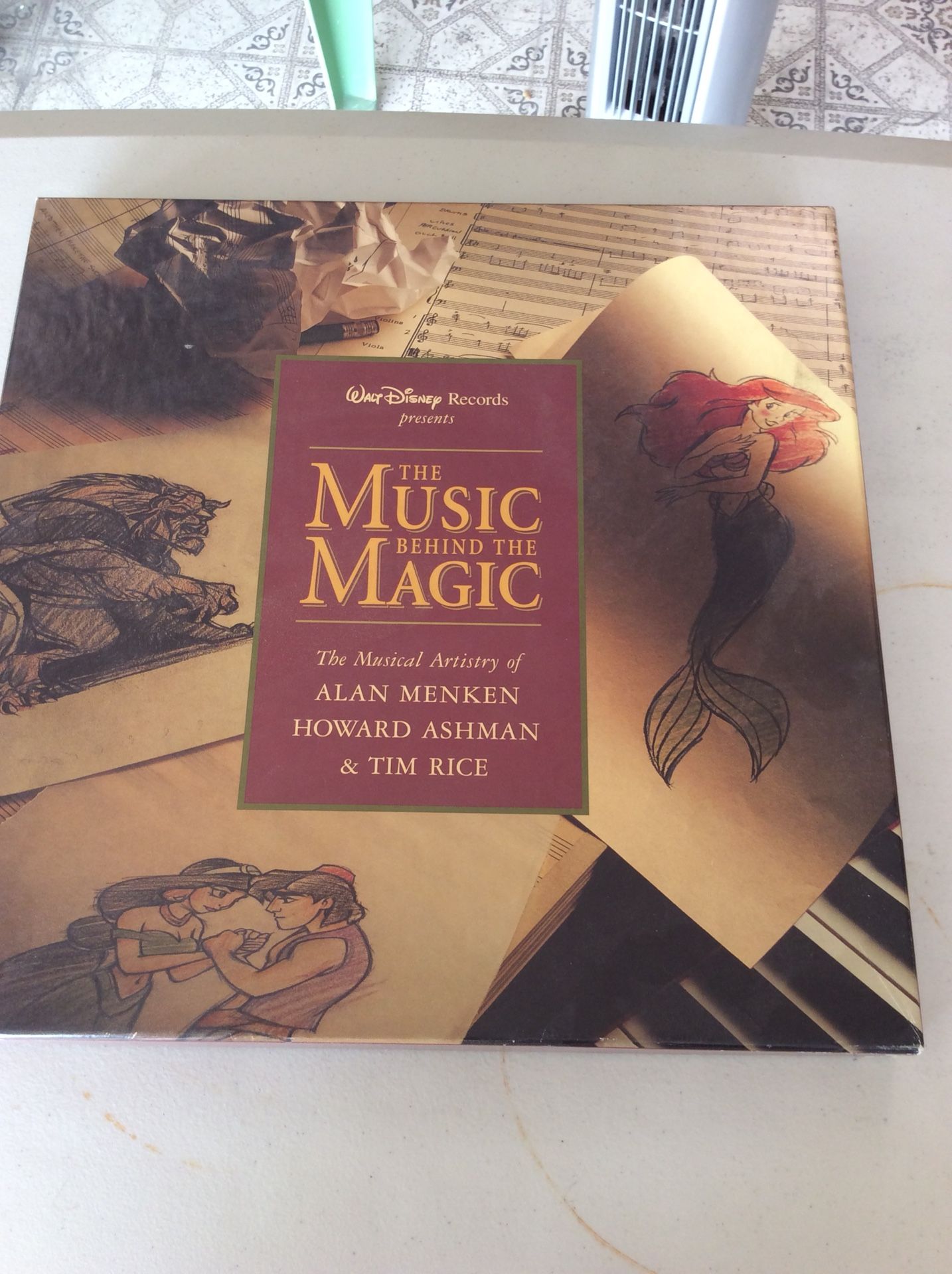 Disney music CDs and book.