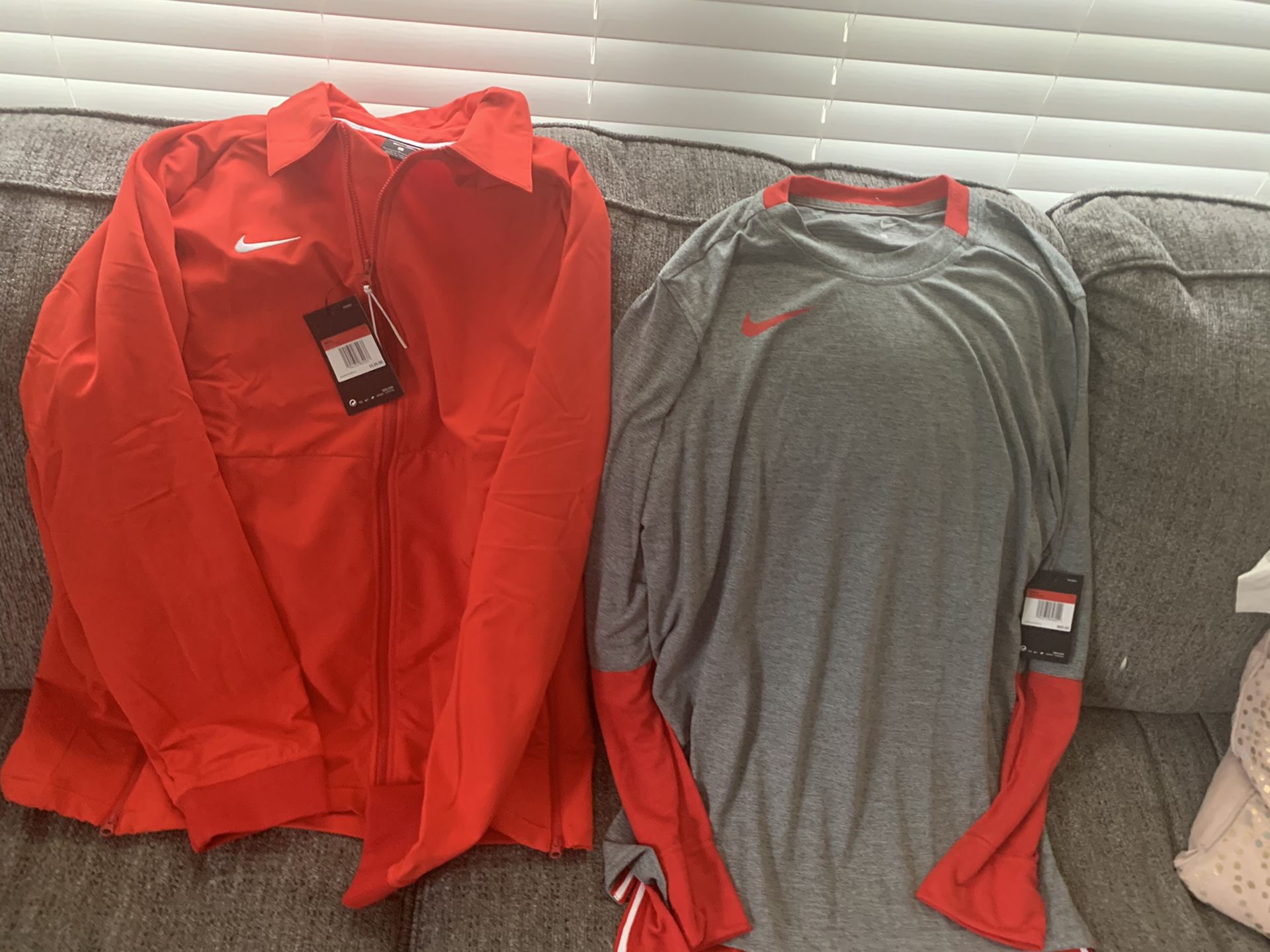 Brand new Nike jacket and Nike sweatshirt. Both size Large. All new with tags.