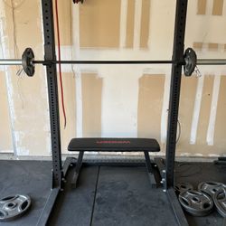 Squat Rack And Weights 