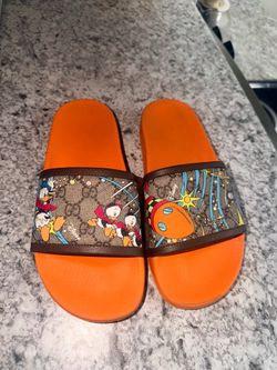 Gucci Disney collab slides