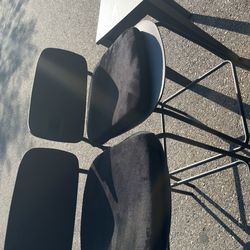 2 kitchen chairs / stools and center table