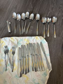 Stainless Steel Forks, Spoons And Knifes