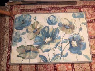 Beautiful large floral wall art featuring soft blue, green, cream, and neutral tones. Comes with a coordinating frame and is in very good condition. P