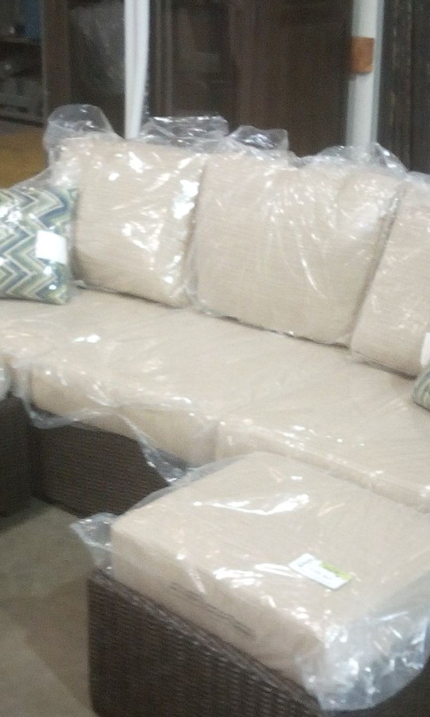 Brand New Patio Couch W/ 2 Ottomans. Includes All Cushions And Decor Pillows Still Wr