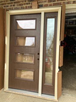 New front door , fiberglass , left in swing , 53 by 81 1/2 by 4 9/16 jamb