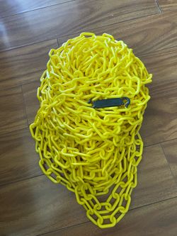 Mr. Chain yellow plastic barrier https://offerup.co/faYXKzQFnY?$deeplink_path=/redirect/ measures 2 inches in link size and is intended for safety and