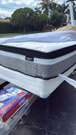 Queen pillow top mattress with box spring