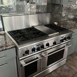 Luxury GE Monogram 6 Burner Gas Stove, Griddle, And Double Oven