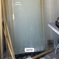 Glass shower door with glass wall