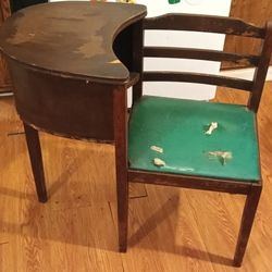 Vantage Telephone Desk With Chair Attached To It