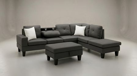 Brand new dark grey sectional sofa with ottoman