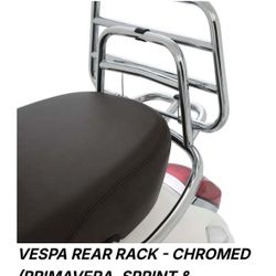 Used PIAGGIO VESPA PRIMAVERA REAR FOLDABLE LUGGAGE RACK Chrome. Some Scratches