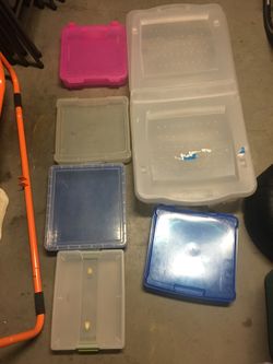 Assorted plastic bins