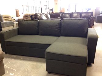 BRAND NEW SECTIONAL SOFA WITH SLEEPER