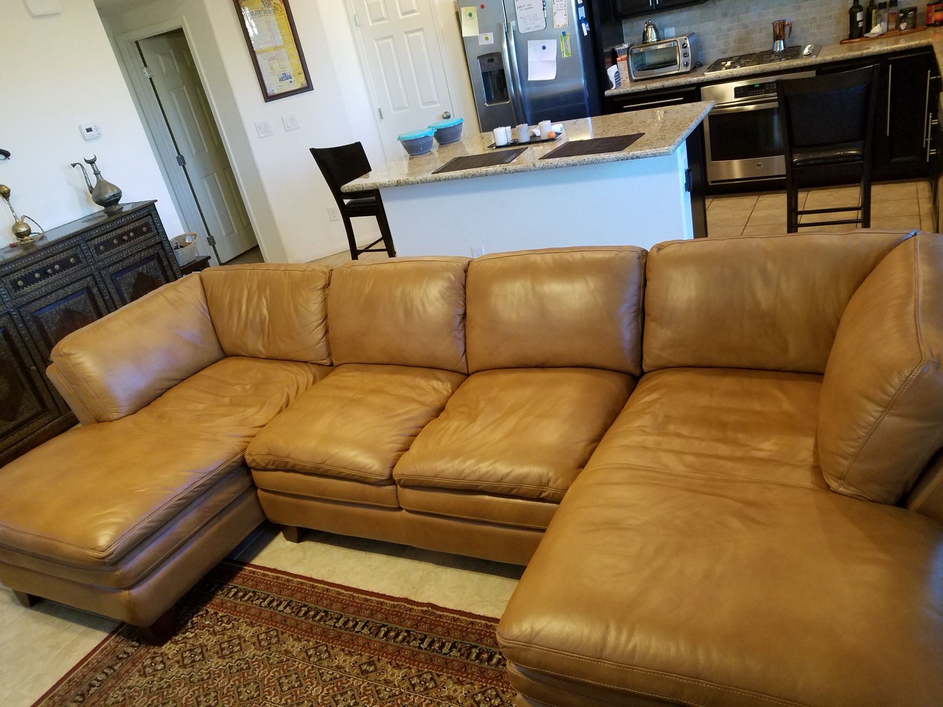 Great 100% leather couch, your house needs it