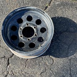 One 15x6 inch 6 lug steel wheel Nissan, Datsun, Chevy c10, GMC, Honda Pilot, Mitsubishi, and more