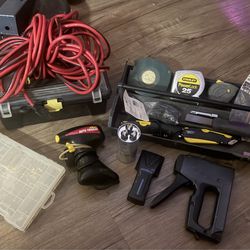 Preowned miscellaneous tools. Tool box, staple gun , 30 ft extension cord, measuring tapes, ETC…. Lo