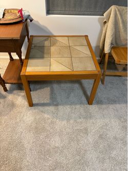 Gangsø Møbler Danish modern coffee table features a teak wood frame with an inlaid geometric ceramic tile top.