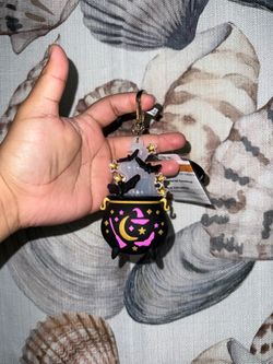 Cauldron hand sanitizer holder