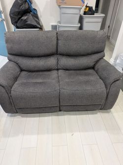 Living space Nash, power reclining love seat and couch