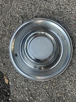 One 15 inch hub cap 1980 Cadillac $45