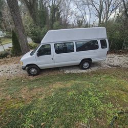 Ford E350 Super Duty raised roof extended