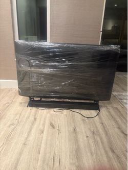 50 inch Samsung with speaker box and bolting set