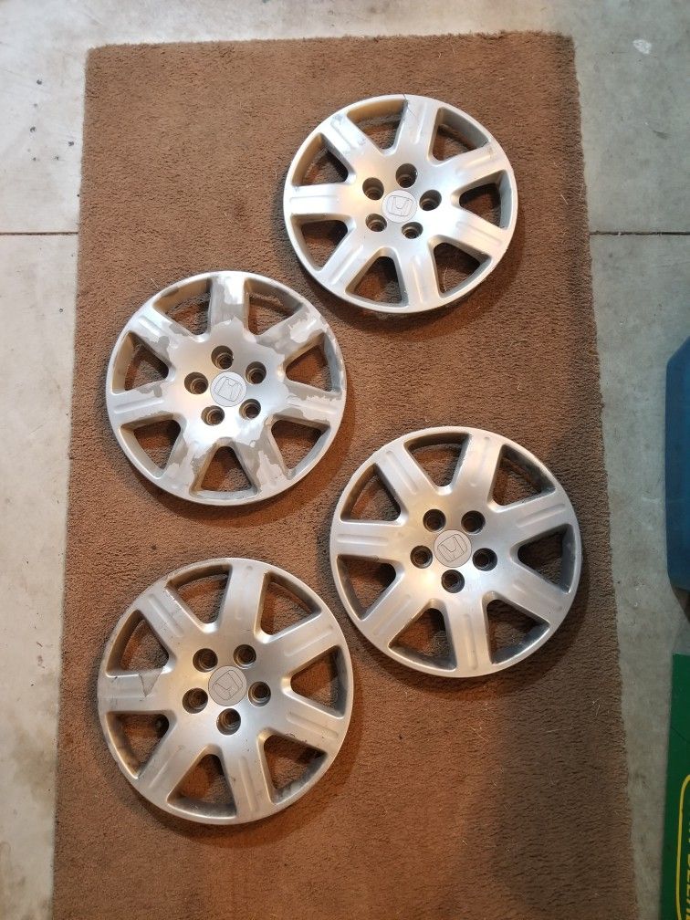 2006 Honda Civic OEM hubcaps set of 4 - 7 Spoke
