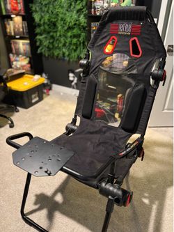 Racing Simulator Bundle – Thrustmaster Wheel & Pedals + Next Level Racing Foldable Cockpit