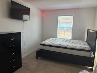 Queen bed with mattress and drawer  Ashley furniture