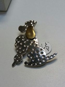 .925 sterling silver poodle pin.