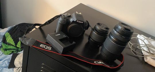 Canon EOS DSLR Camera with Two Lenses