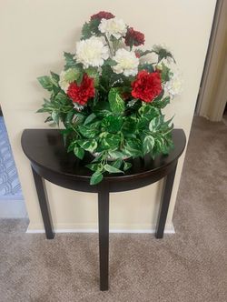 Dark wood half moon console table with artificial floral basket centerpiece details in photos pickup Gaithersburg md20877
