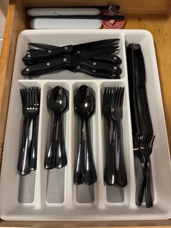 Black silverware set with organizer