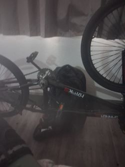 Trick bike all black with red writing