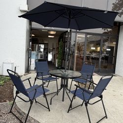 New 6-Piece Patio Dining Set with Glass Table, 4 Folding Chairs, and 7.5Ft Umbrella