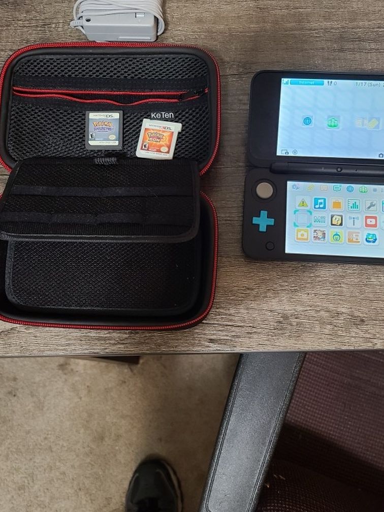New 2DS With Case And 2 Pokémon Games