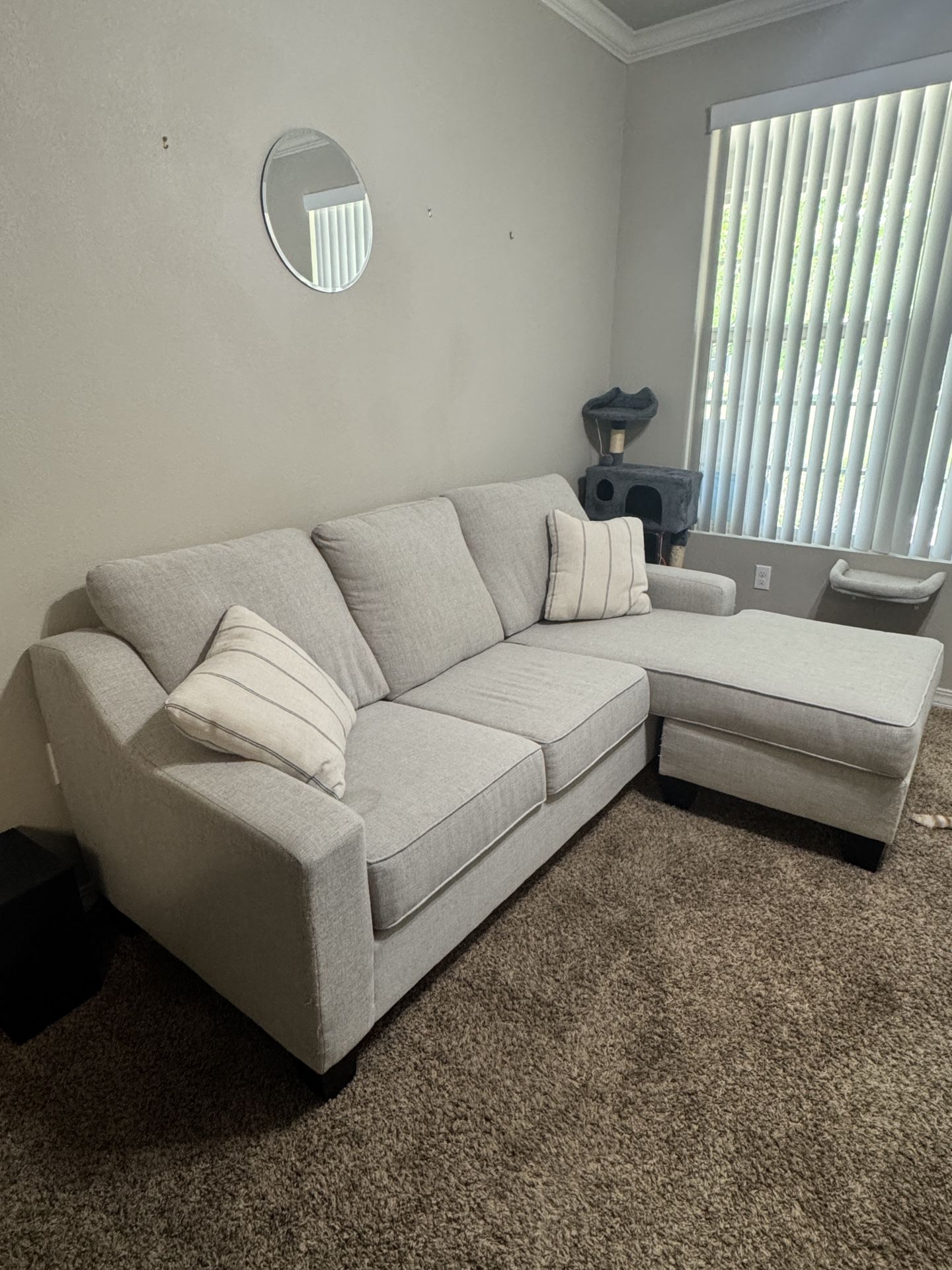 Beige Couch with pillows