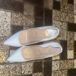 White Christian Louboutin Hells 