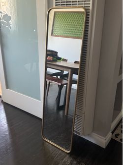 Long Gold framed mirror